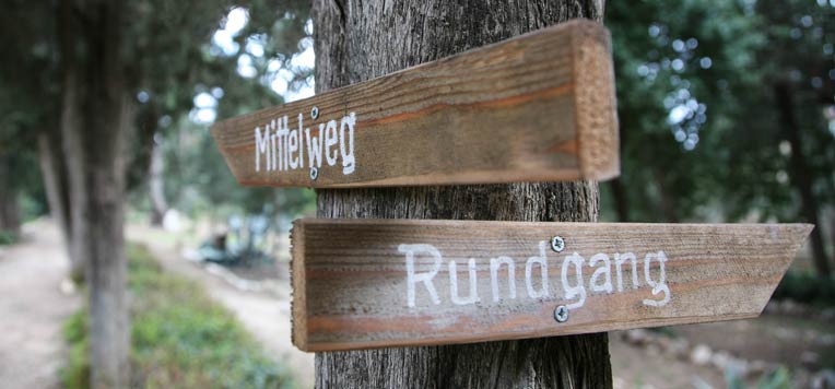 sign in the monastery garden of the German Hospice